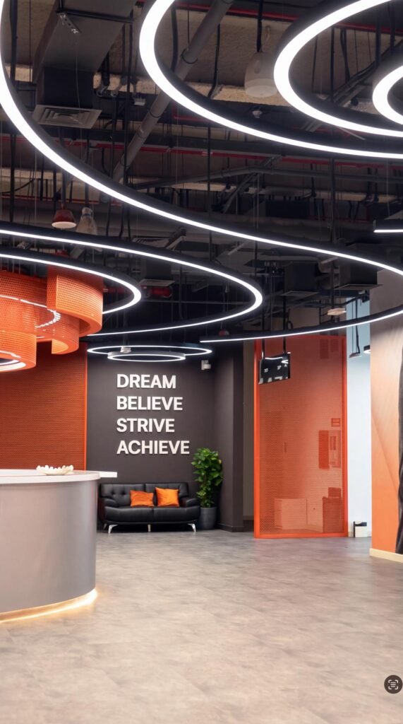 Member lounge with Dream Believe Strive Achieve wall